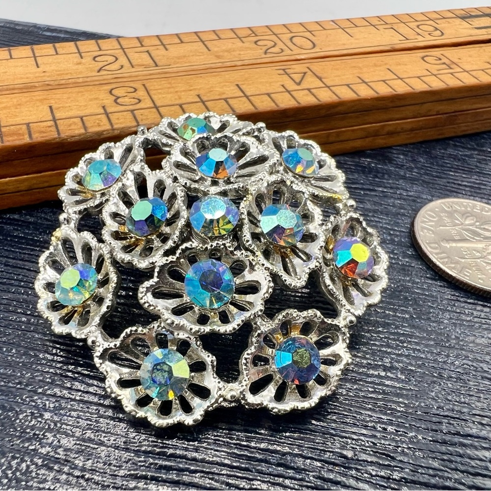 Vintage silver tone floral cutout AB rhinestone dome brooch pin